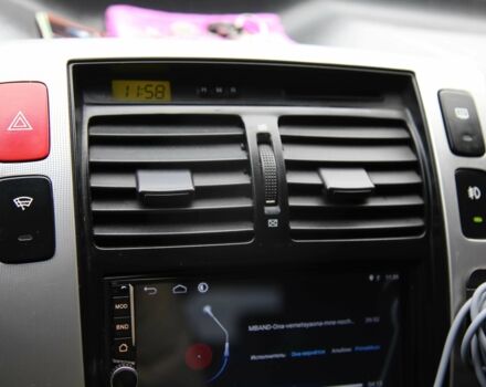 Черный Хендай Туксон, объемом двигателя 2.7 л и пробегом 217 тыс. км за 8600 $, фото 15 на Automoto.ua