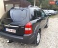 Черный Хендай Туксон, объемом двигателя 2 л и пробегом 183 тыс. км за 8300 $, фото 1 на Automoto.ua