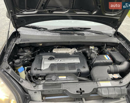 Черный Хендай Туксон, объемом двигателя 2 л и пробегом 216 тыс. км за 7500 $, фото 35 на Automoto.ua