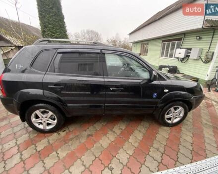 Чорний Хендай Туксон, об'ємом двигуна 1.98 л та пробігом 202 тис. км за 7350 $, фото 12 на Automoto.ua