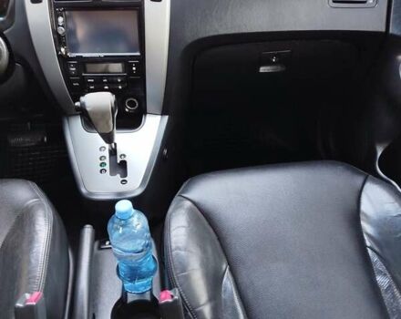 Черный Хендай Туксон, объемом двигателя 2.7 л и пробегом 290 тыс. км за 7300 $, фото 7 на Automoto.ua