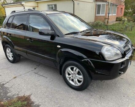 Черный Хендай Туксон, объемом двигателя 2 л и пробегом 163 тыс. км за 7700 $, фото 2 на Automoto.ua
