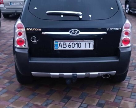 Черный Хендай Туксон, объемом двигателя 2 л и пробегом 124 тыс. км за 7200 $, фото 1 на Automoto.ua