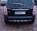 Черный Хендай Туксон, объемом двигателя 2 л и пробегом 124 тыс. км за 7200 $, фото 1 на Automoto.ua