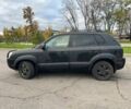 Чорний Хендай Туксон, об'ємом двигуна 2 л та пробігом 397 тис. км за 3900 $, фото 1 на Automoto.ua