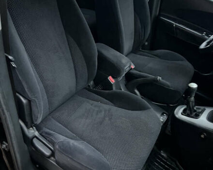 Черный Хендай Туксон, объемом двигателя 1.98 л и пробегом 227 тыс. км за 6900 $, фото 25 на Automoto.ua