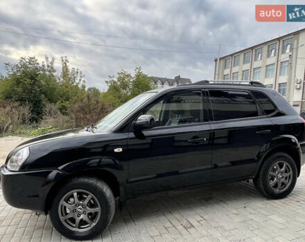 Чорний Хендай Туксон, об'ємом двигуна 2 л та пробігом 144 тис. км за 6599 $, фото 4 на Automoto.ua