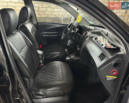 Чорний Хендай Туксон, об'ємом двигуна 2 л та пробігом 252 тис. км за 3000 $, фото 14 на Automoto.ua