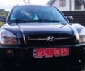 Черный Хендай Туксон, объемом двигателя 2 л и пробегом 205 тыс. км за 7200 $, фото 24 на Automoto.ua