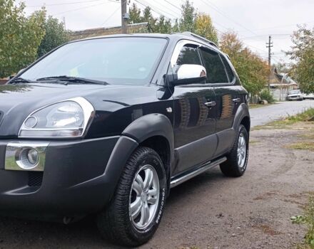 Черный Хендай Туксон, объемом двигателя 2 л и пробегом 124 тыс. км за 7200 $, фото 10 на Automoto.ua