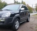Черный Хендай Туксон, объемом двигателя 2 л и пробегом 124 тыс. км за 7200 $, фото 10 на Automoto.ua