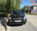 Черный Хендай Туксон, объемом двигателя 2 л и пробегом 255 тыс. км за 7150 $, фото 3 на Automoto.ua