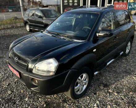 Черный Хендай Туксон, объемом двигателя 1.98 л и пробегом 191 тыс. км за 8300 $, фото 24 на Automoto.ua