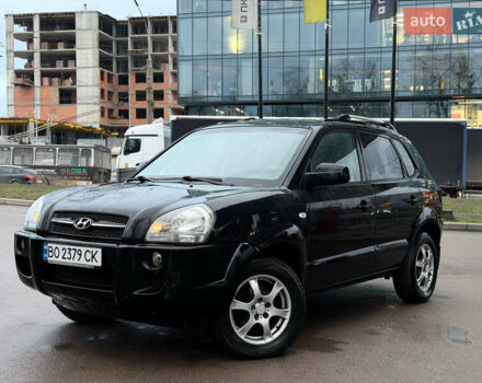 Чорний Хендай Туксон, об'ємом двигуна 1.99 л та пробігом 310 тис. км за 6399 $, фото 9 на Automoto.ua