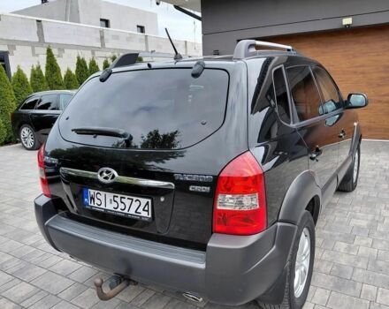 Черный Хендай Туксон, объемом двигателя 2 л и пробегом 233 тыс. км за 7000 $, фото 6 на Automoto.ua