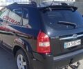 Черный Хендай Туксон, объемом двигателя 2 л и пробегом 277 тыс. км за 7800 $, фото 31 на Automoto.ua