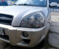 Черный Хендай Туксон, объемом двигателя 2 л и пробегом 240 тыс. км за 4200 $, фото 3 на Automoto.ua