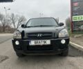 Черный Хендай Туксон, объемом двигателя 2 л и пробегом 174 тыс. км за 8000 $, фото 1 на Automoto.ua