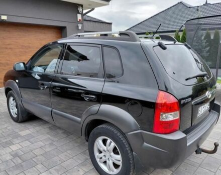 Черный Хендай Туксон, объемом двигателя 2 л и пробегом 298 тыс. км за 2200 $, фото 4 на Automoto.ua