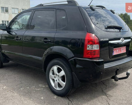 Черный Хендай Туксон, объемом двигателя 2 л и пробегом 236 тыс. км за 6950 $, фото 3 на Automoto.ua
