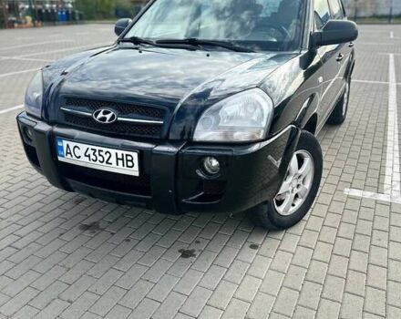 Черный Хендай Туксон, объемом двигателя 1.98 л и пробегом 277 тыс. км за 5350 $, фото 12 на Automoto.ua