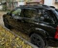 Черный Хендай Туксон, объемом двигателя 2 л и пробегом 240 тыс. км за 5600 $, фото 3 на Automoto.ua