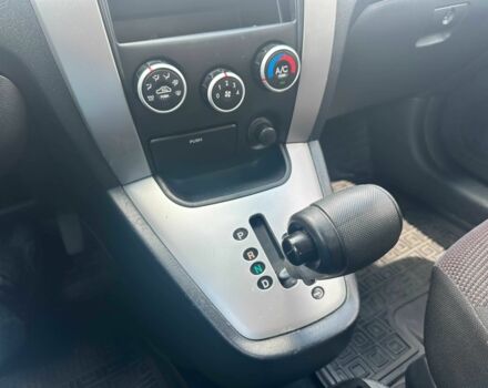 Чорний Хендай Туксон, об'ємом двигуна 2 л та пробігом 306 тис. км за 6900 $, фото 11 на Automoto.ua