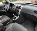 Черный Хендай Туксон, объемом двигателя 2 л и пробегом 249 тыс. км за 8300 $, фото 31 на Automoto.ua