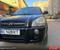 Черный Хендай Туксон, объемом двигателя 2 л и пробегом 235 тыс. км за 6400 $, фото 4 на Automoto.ua
