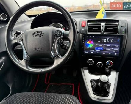 Чорний Хендай Туксон, об'ємом двигуна 2 л та пробігом 124 тис. км за 7950 $, фото 16 на Automoto.ua