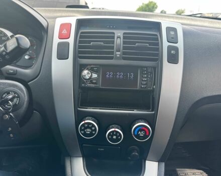 Чорний Хендай Туксон, об'ємом двигуна 2 л та пробігом 306 тис. км за 6900 $, фото 10 на Automoto.ua