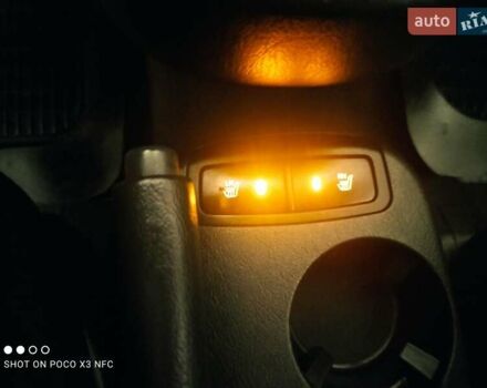 Черный Хендай Туксон, объемом двигателя 2 л и пробегом 237 тыс. км за 7999 $, фото 20 на Automoto.ua