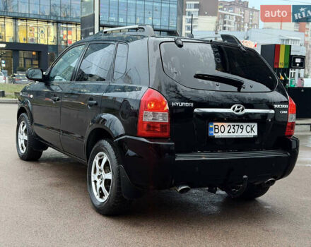 Чорний Хендай Туксон, об'ємом двигуна 1.99 л та пробігом 310 тис. км за 6399 $, фото 12 на Automoto.ua