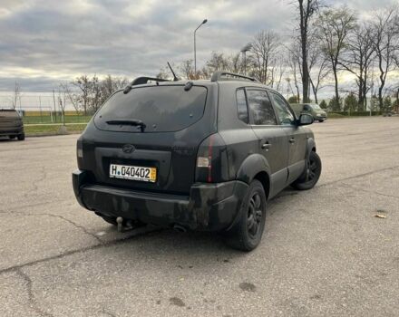 Черный Хендай Туксон, объемом двигателя 2 л и пробегом 397 тыс. км за 3900 $, фото 3 на Automoto.ua