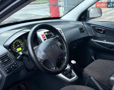 Чорний Хендай Туксон, об'ємом двигуна 1.99 л та пробігом 310 тис. км за 6399 $, фото 17 на Automoto.ua