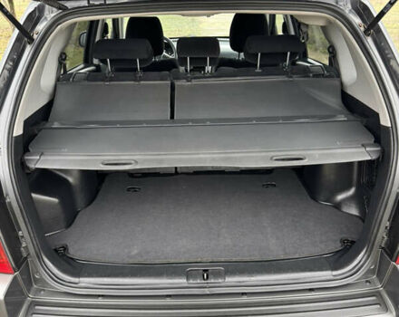 Черный Хендай Туксон, объемом двигателя 2 л и пробегом 201 тыс. км за 7750 $, фото 55 на Automoto.ua