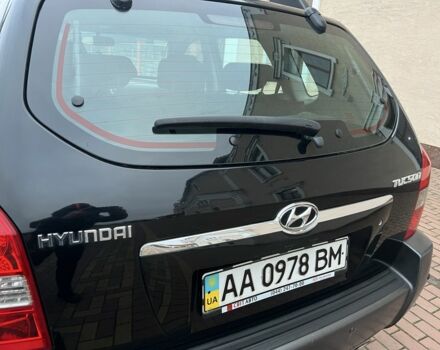 Черный Хендай Туксон, объемом двигателя 2 л и пробегом 220 тыс. км за 7200 $, фото 11 на Automoto.ua