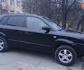 Черный Хендай Туксон, объемом двигателя 1.98 л и пробегом 320 тыс. км за 6300 $, фото 2 на Automoto.ua