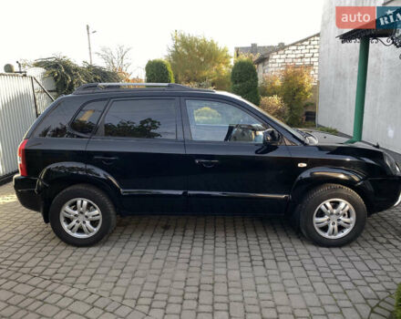 Чорний Хендай Туксон, об'ємом двигуна 1.98 л та пробігом 233 тис. км за 7650 $, фото 3 на Automoto.ua