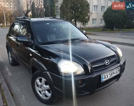 Чорний Хендай Туксон, об'ємом двигуна 1.99 л та пробігом 239 тис. км за 6990 $, фото 6 на Automoto.ua