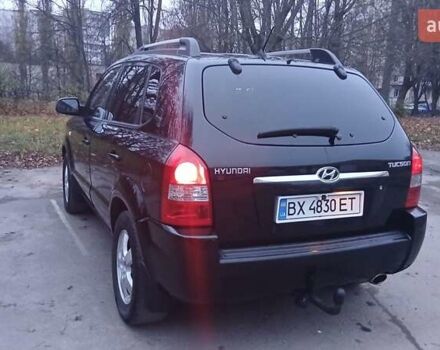 Черный Хендай Туксон, объемом двигателя 1.98 л и пробегом 320 тыс. км за 6300 $, фото 10 на Automoto.ua