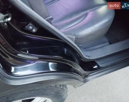 Чорний Хендай Туксон, об'ємом двигуна 1.99 л та пробігом 239 тис. км за 6990 $, фото 28 на Automoto.ua