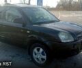 Черный Хендай Туксон, объемом двигателя 2 л и пробегом 260 тыс. км за 8000 $, фото 2 на Automoto.ua
