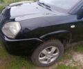 Черный Хендай Туксон, объемом двигателя 2 л и пробегом 240 тыс. км за 6710 $, фото 6 на Automoto.ua