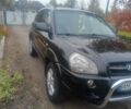 Черный Хендай Туксон, объемом двигателя 2 л и пробегом 231 тыс. км за 8500 $, фото 12 на Automoto.ua