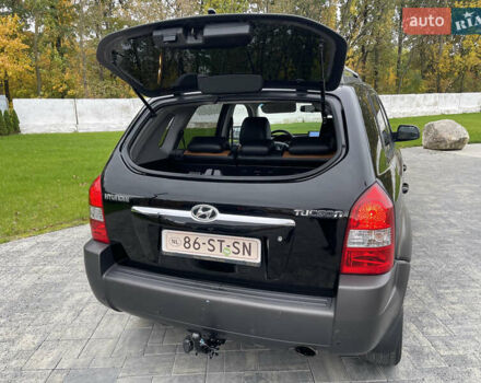 Черный Хендай Туксон, объемом двигателя 2 л и пробегом 216 тыс. км за 7500 $, фото 26 на Automoto.ua