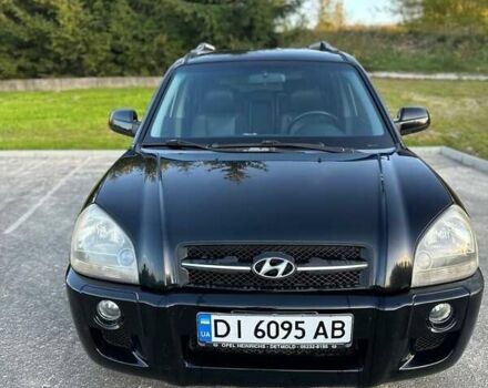 Черный Хендай Туксон, объемом двигателя 2 л и пробегом 235 тыс. км за 6700 $, фото 3 на Automoto.ua