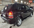 Чорний Хендай Туксон, об'ємом двигуна 2 л та пробігом 252 тис. км за 3000 $, фото 7 на Automoto.ua