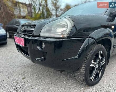 Чорний Хендай Туксон, об'ємом двигуна 2 л та пробігом 167 тис. км за 7950 $, фото 21 на Automoto.ua