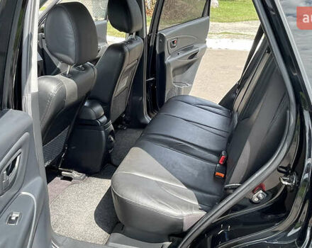 Черный Хендай Туксон, объемом двигателя 2 л и пробегом 236 тыс. км за 6950 $, фото 9 на Automoto.ua